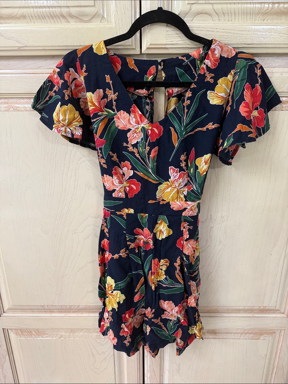 Floral Navy V‑Neck Short Romper with Flutter Sleeves